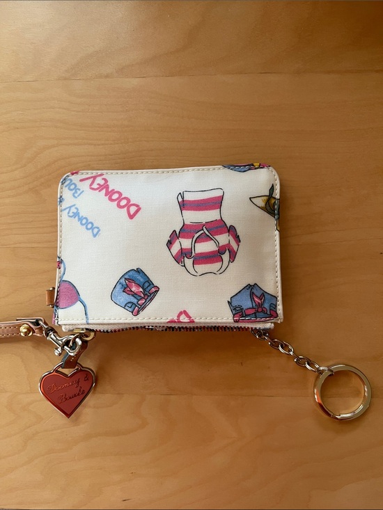 Dooney & Bourke Handbags - Dooney & Bourke Cream Wallet with Pink and Blue Motif and Heart Charm